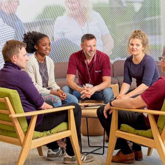 People sitting in an office talking