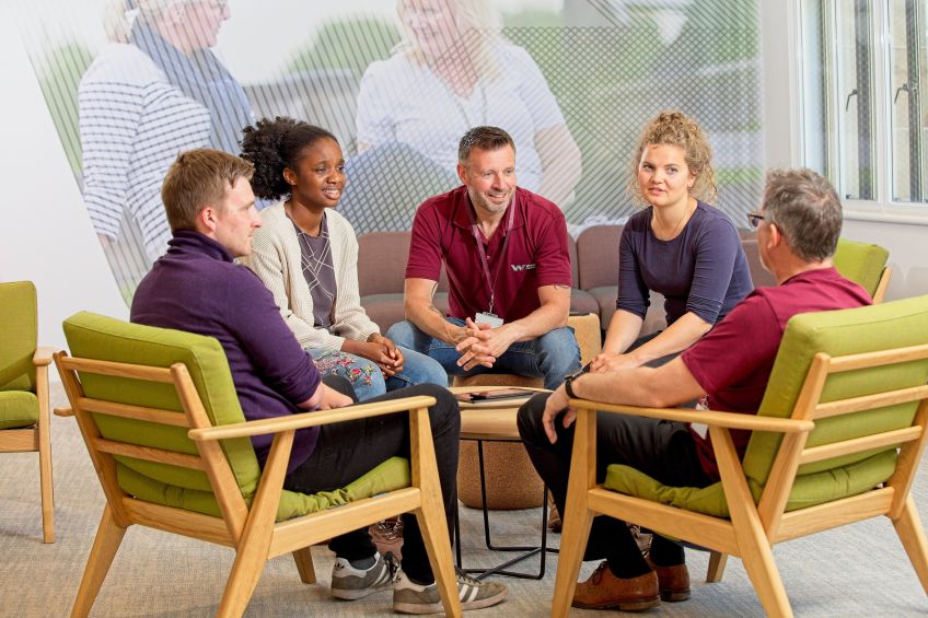 People sitting in an office talking