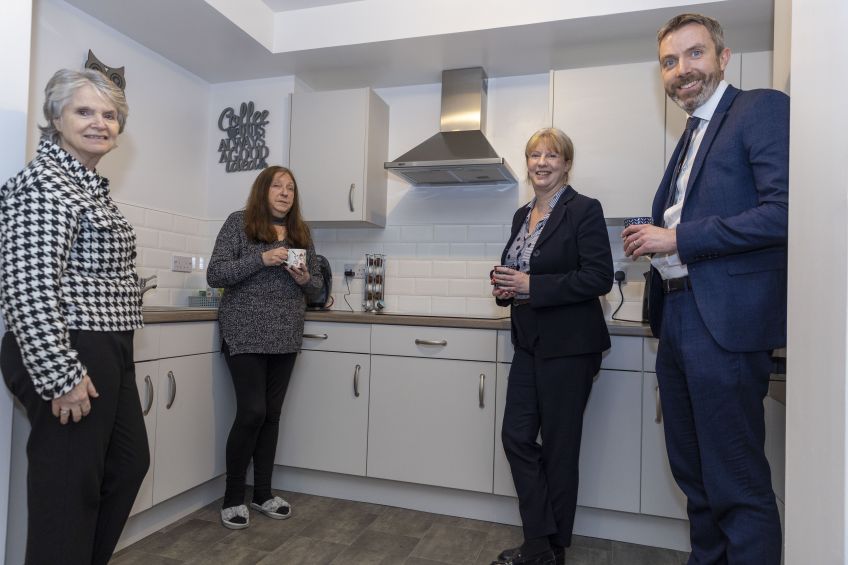 Wheatley Group Chair Jo Armstrong, tenant Helen Angus, Cabinet Secretary for social justice, housing and local government, Shona Robison MSP and Wheatley Group Chief Executive Steven Henderson in one of the new properties at Almondvale. 
