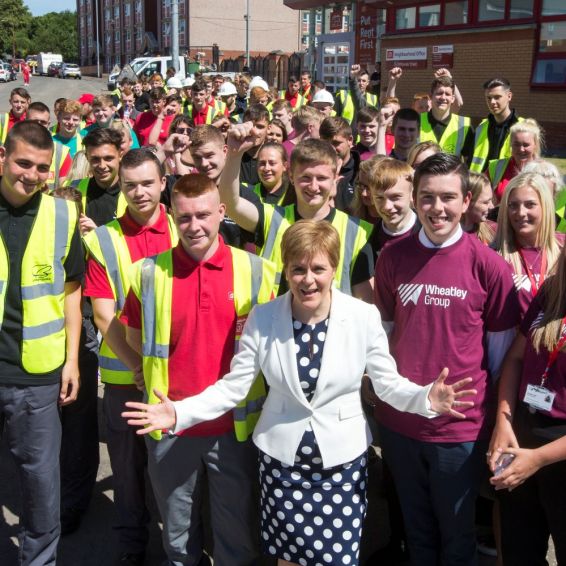 First Minister is joined by apprentices at EIB funding deal