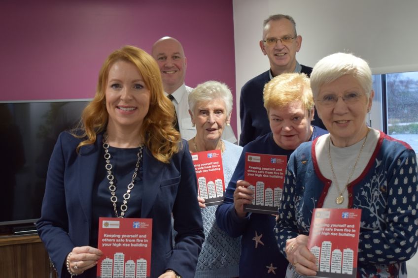 Community Safety Minister Ash Denham launches fire safety leaflet for high-rise residents.