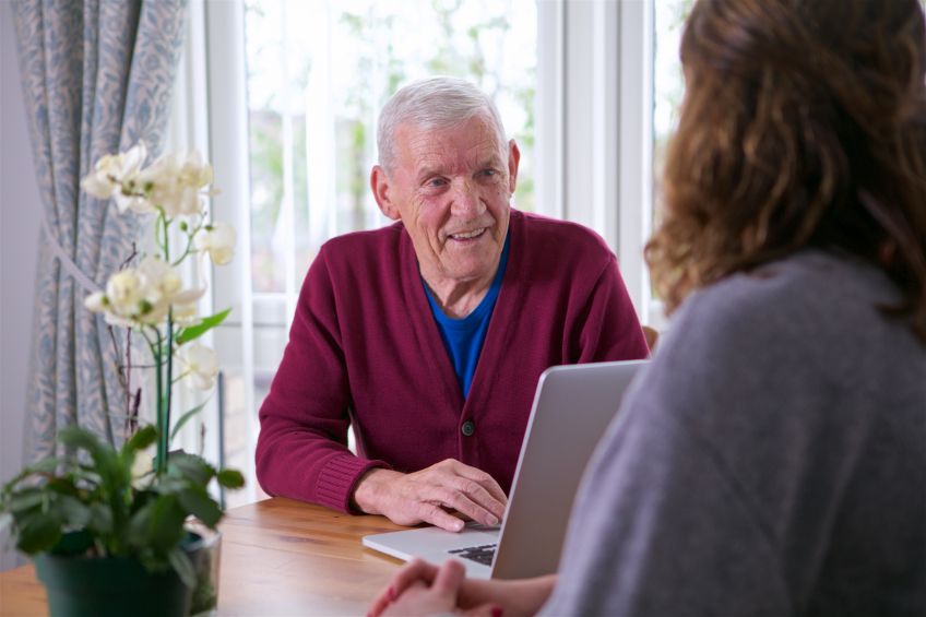 Stock image - housing officer with tenant